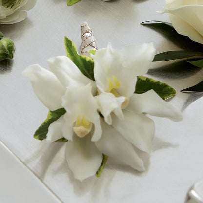 White Mini Cymbidium Boutonniere – BEBE'S FLOWER SHOP, Los Angeles CA